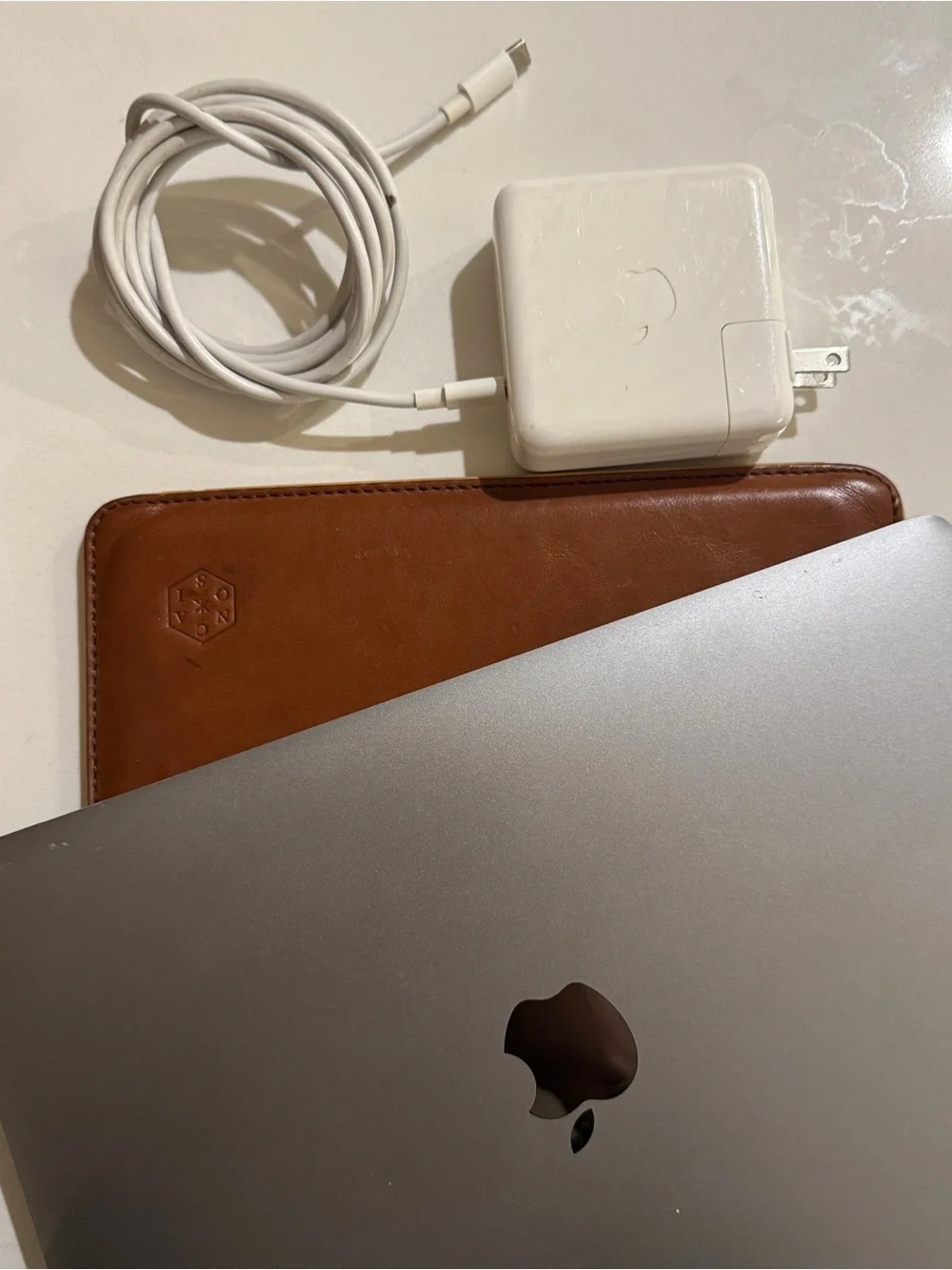 Used 2015 Apple MacBook in Space Gray with Charger and Sleeve case